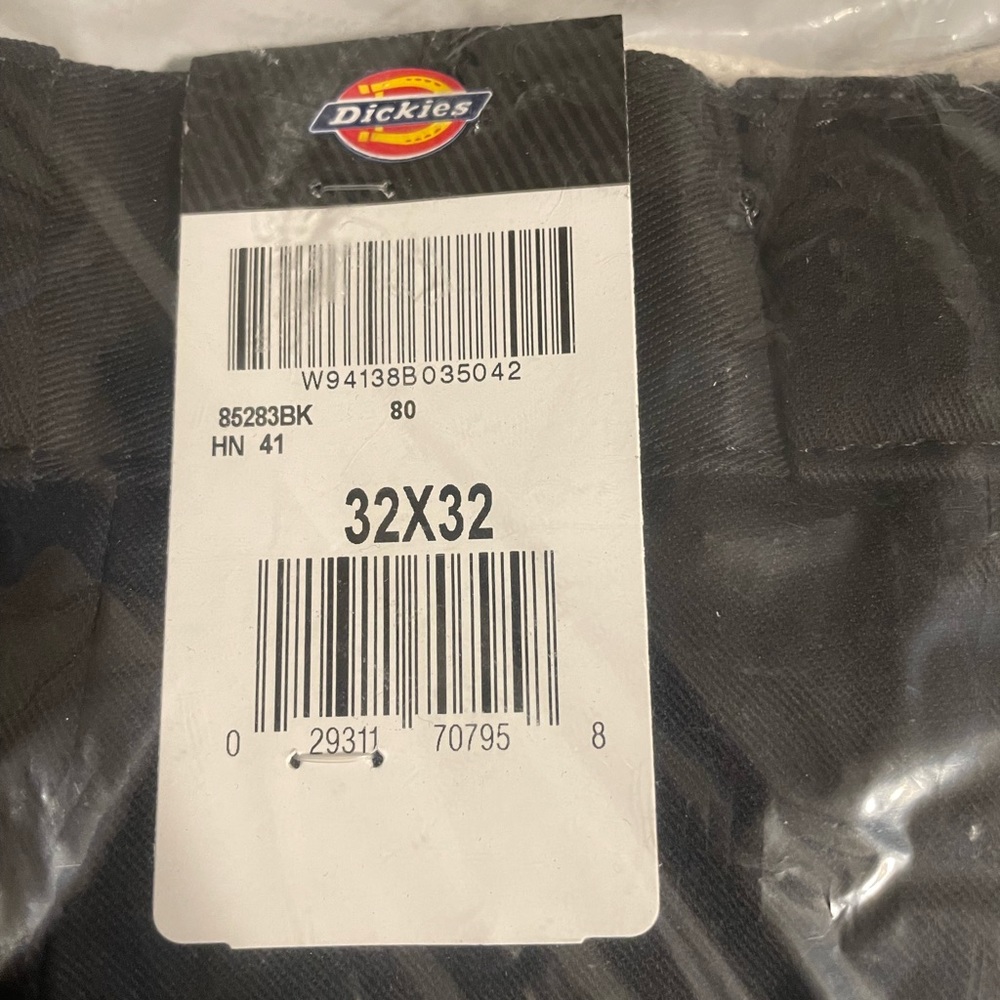 Three pairs of Dickies work pants
